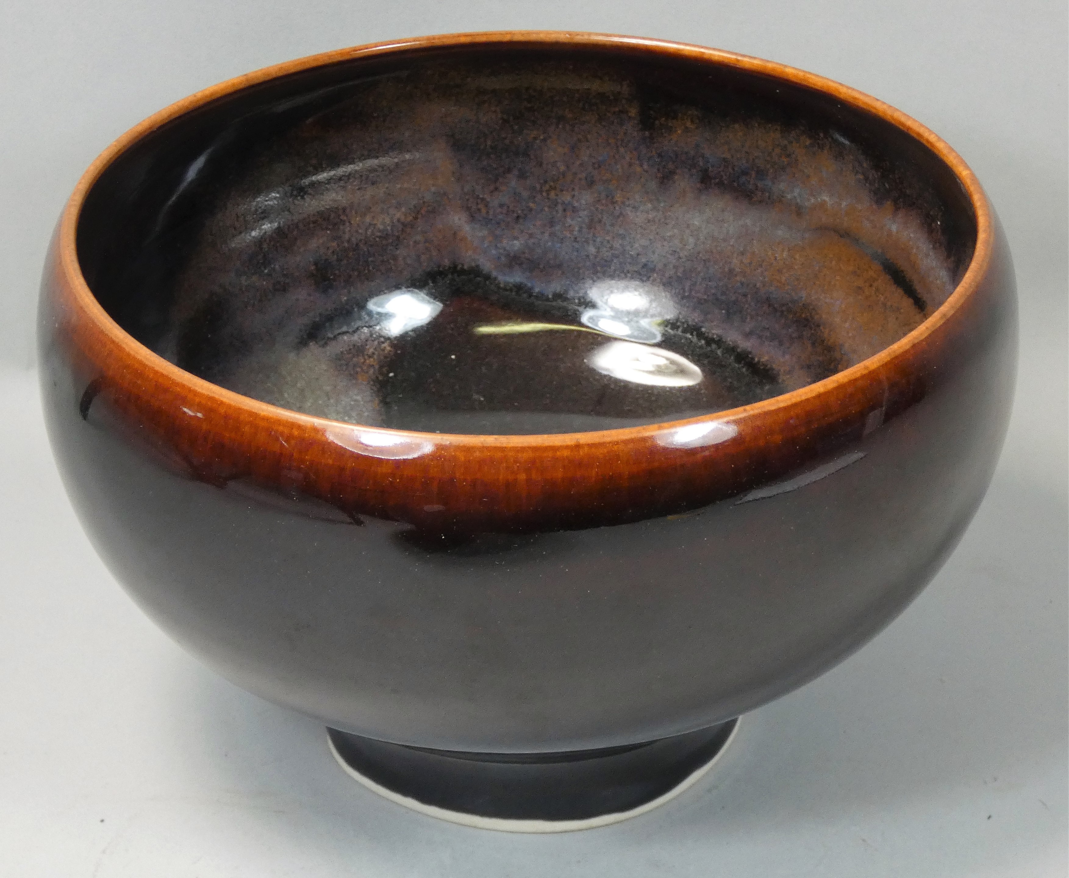 Chris Carter (b.1945), a porcelain brown glazed bowl, no makers mark, diameter 20.5cm.
