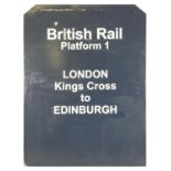 A metal railway sign 'British Rail Platform 1', London Kings Cross to Edinburgh, in Northern