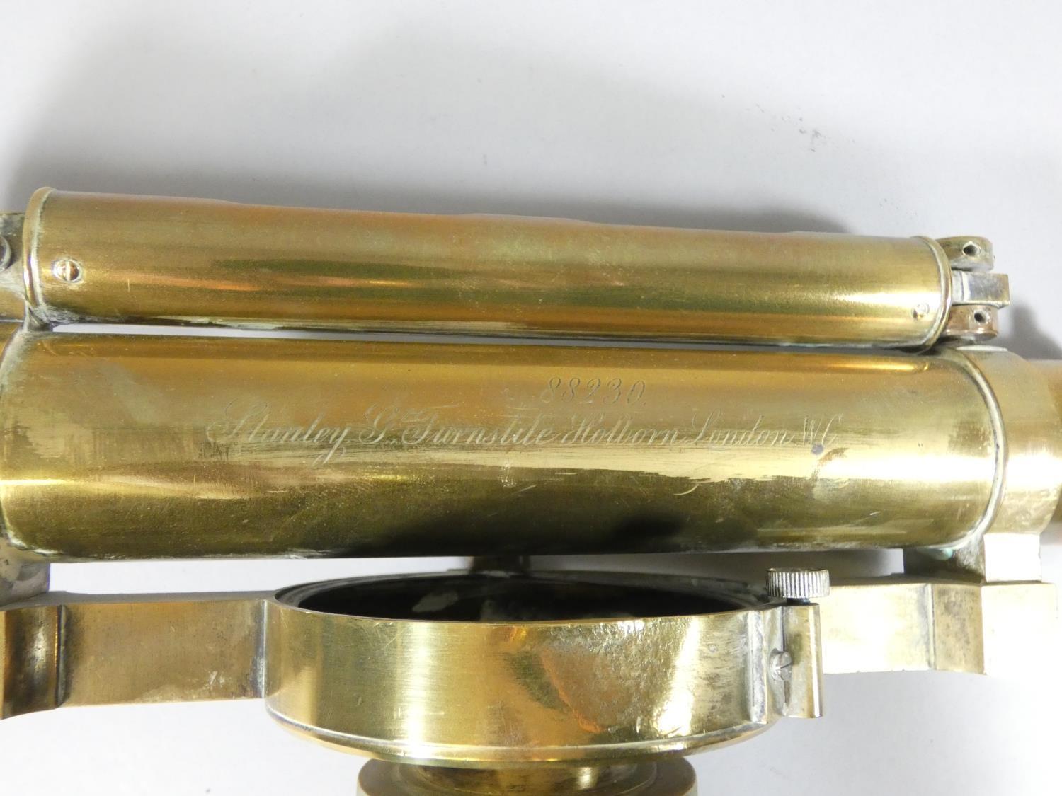 A brass theodolite on tripod marked ?88230 Stanley G. Turnstile Holburn London W.C.?, height - Image 2 of 2