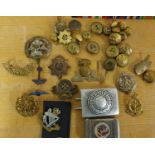 A German Gott Mit Uns belt buckle, worn, various cap badges and buttons.