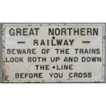 A cast iron railway sign, 'Great Northern Railway Beware of the Trains...', 32 x 56cm.