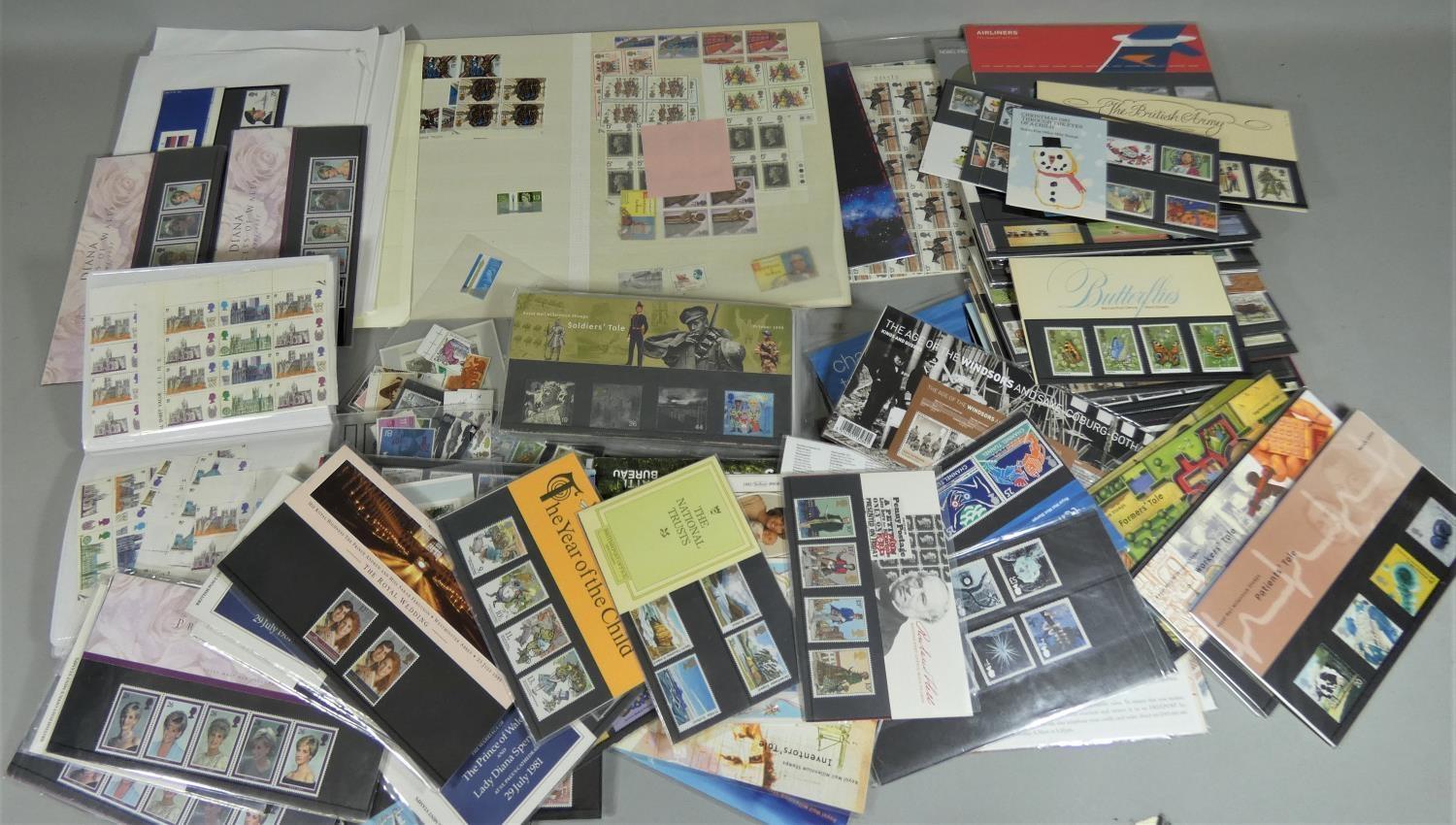 A collection of postally valid GB mint stamps, mainly in presentation packs, some sheets, over £