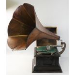 An Edwardian wind up gramophone, with ebonised case and oak horn, winding key.