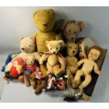 An assortment of vintage stuffed teddy bears, to include limited edition Bean Bear, Merrythought