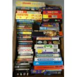Approximately fifty ZX Spectrum cassette tape games in small and large cases, all tapes fast forward