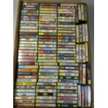 Approximately one hundred and twenty ZX Spectrum cassette tape games in small cases, with