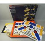 A boxed Meccano Tri-ang construction set, '395 parts for all-action models', appears mostly