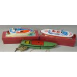 Two boxed and one unboxed tinplate clockwork wind-up speed boats, to include Lines Bros. in green