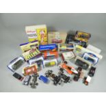 Various Makers - an assorted collection of boxed and unboxed die-cast models, to include Bburago,