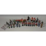 A collection of Britains and similar lead figures, to include cavalry, soldiers and animals.