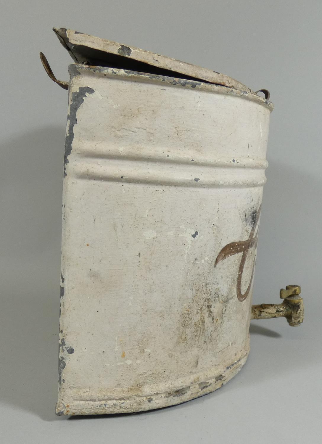 A 'Nestle Cream' tin container of semicylinder form, with tap to the front, height 25cm. - Image 2 of 3