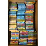 Approximately one hundred ZX Spectrum magazine cover cassette tape games in small cases, with full