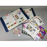 An extensive collection of stamps, including 2 albums of unused stamps with categories to include