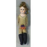 A vintage bisque doll with closing eyes and open mouth, marked 'Germany' and 'J', length together