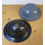 A Belgium WWII metal helmet, stamped BMB and another WWII helmet dated 1941 (2).