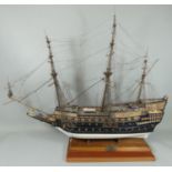 A model of a man o' war vessel, 'Sovereign of the Sea', mounted on an oak base with brass plaque,