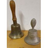 An RAF Benevolent Fund hand bell, a silver metal bell with three heads of war leaders (Churchill,