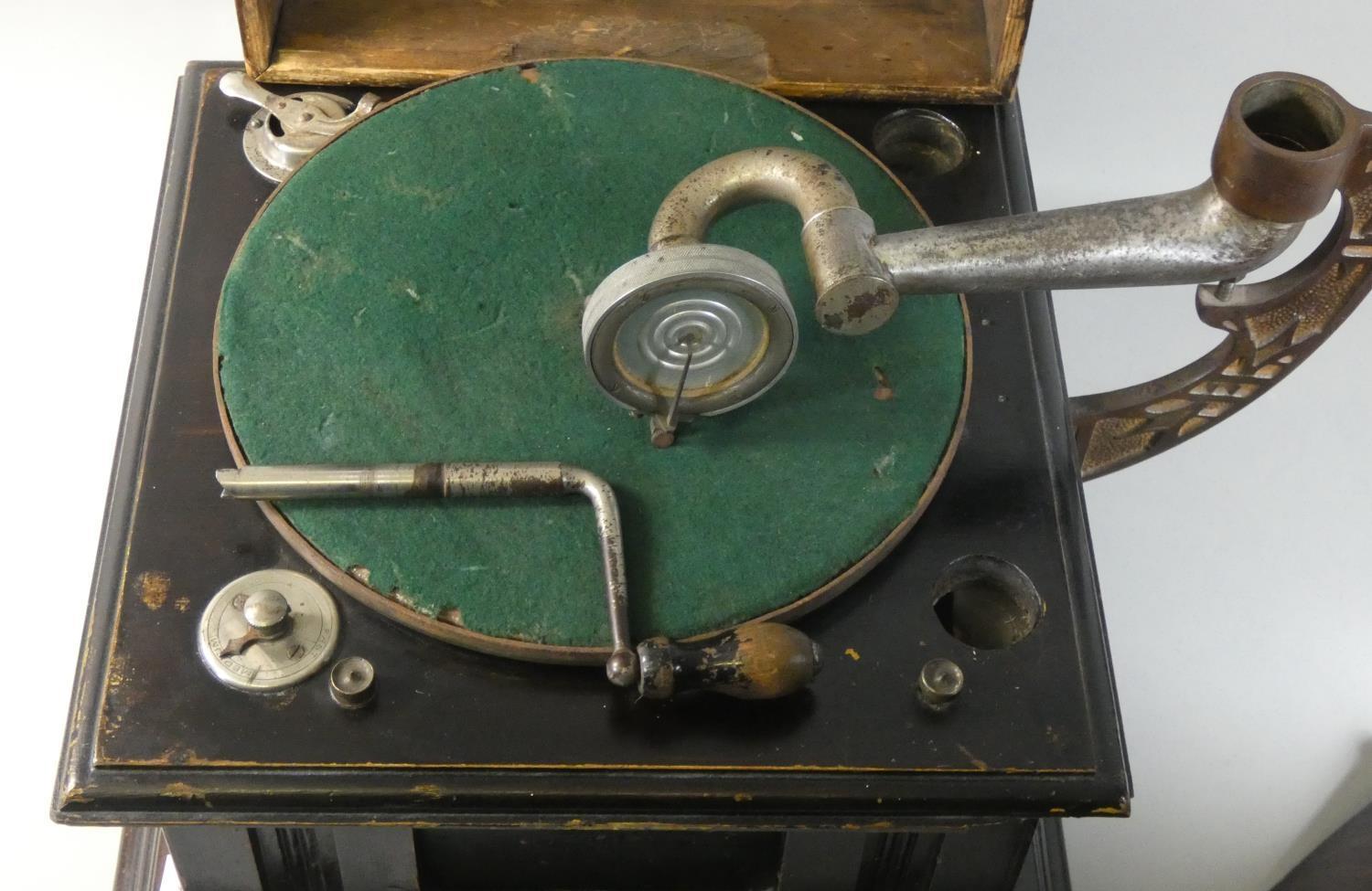 An Edwardian wind up gramophone, with ebonised case and oak horn, winding key. - Image 2 of 2