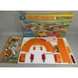 Matchbox - a boxed Matchbox battery operated Motorway, No. M-2, together with assorted die-cast