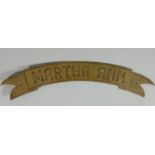 A brass 'Martha Ann' wagon plate, label verso states Tram Ladyshore Colliery, length 47cm.