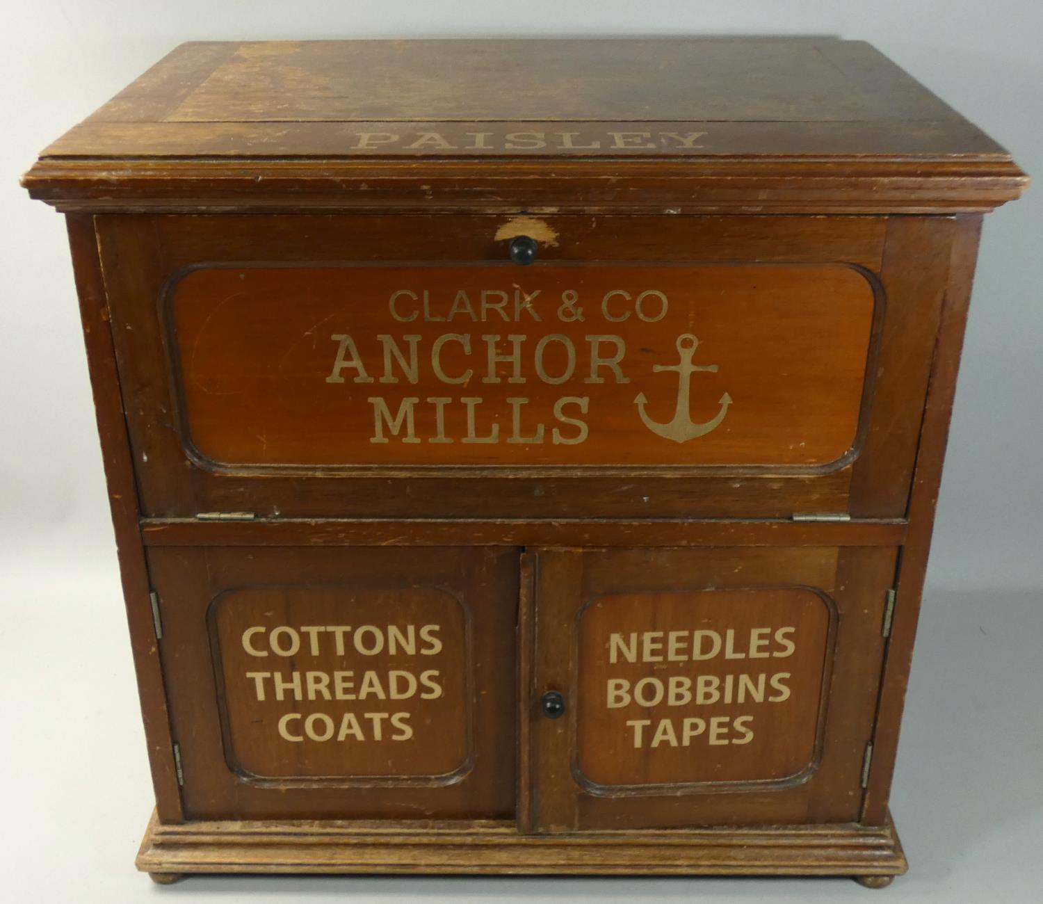 A mahogany sewing cabinet with painted 'Paisley' and 'Clark & Co Anchor Mills', one hinged drawer