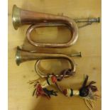 A War Department copper and brass Premier bugle, dated 1936 and 9, 36 cm and a smaller bugle (2).