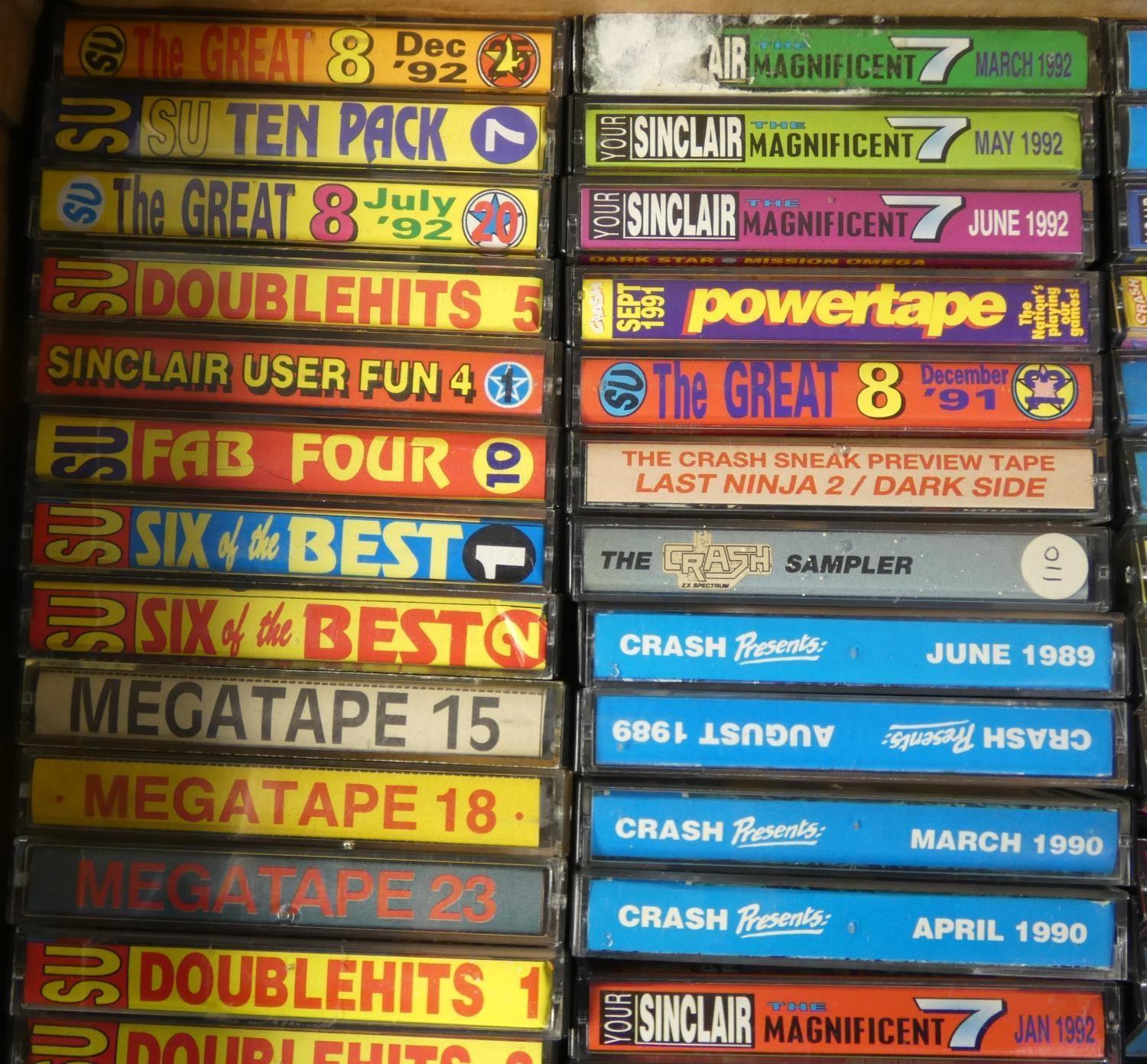 Approximately eighty ZX Spectrum magazine cover cassette tape games in small cases, with full - Image 2 of 6