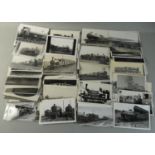 A quantity of approximately 200 black & white photos of steam locomotives.
