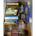 Approximately sixty C64 magazine cover cassette tape games in small and large cases, to include