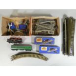 Hornby 'OO' gauge - a quantity of railway track, together with two boxed electrically operated