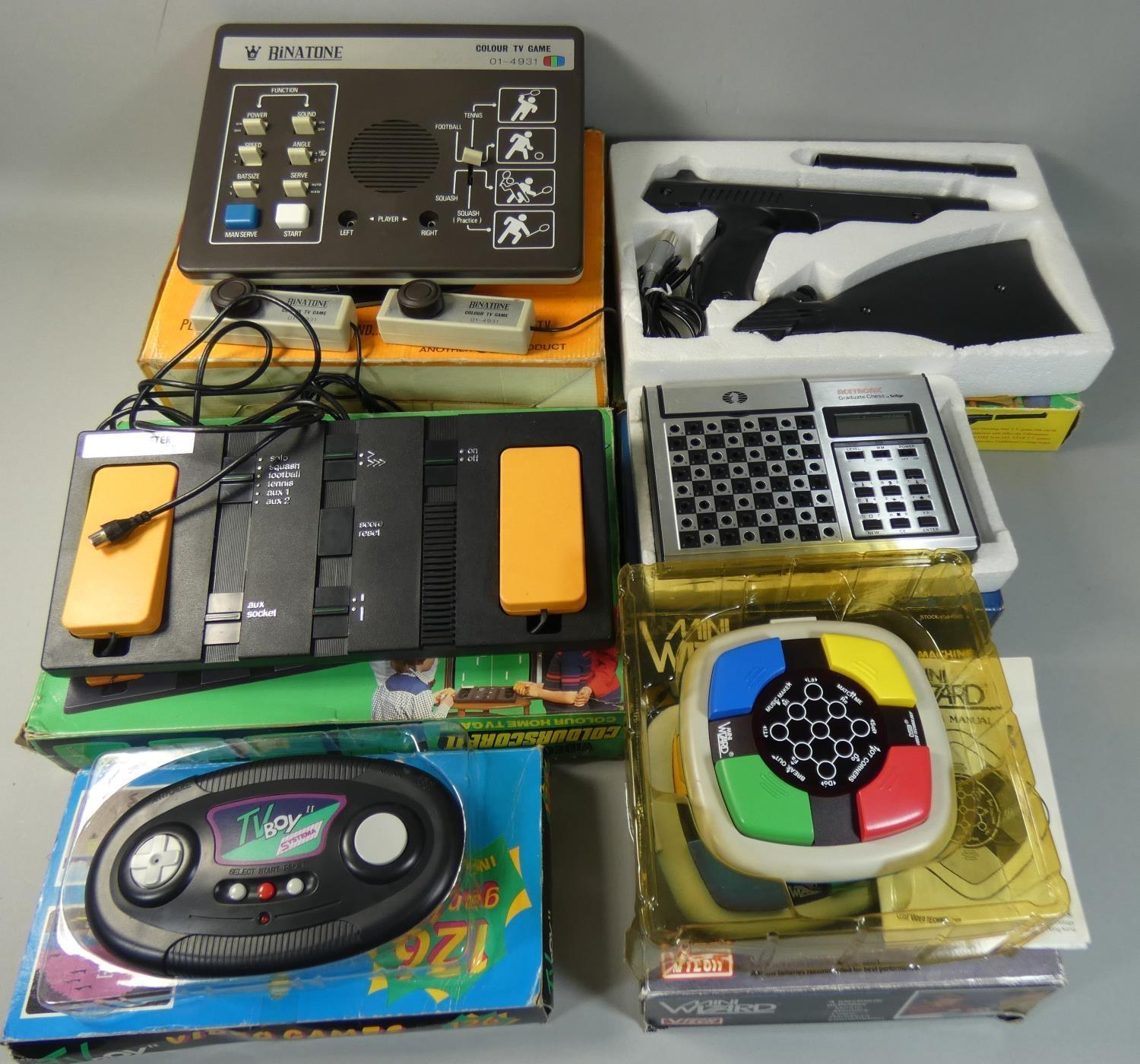 A boxed Binatone colour television game, model No. 01/4931, together with other boxed games