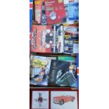 A collection of car related books, mainly MG.
