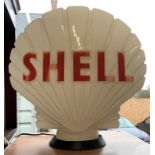 A Shell white glass petrol pump globe, Property of Shell - Mex & B.P. Ltd, height 45 cm.