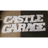 A set of plastic forecourt display letters for Castle Garage, each letter 30 cm high.