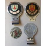 A Scotland enamel grill badge, together with three bumper badges, Hampshire, Glamorganshire and a