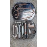 A Jaguar Mk II tool kit, in metal case, lacking one spanner and Girling tin.