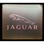 An illuminated Jaguar display sign, 58 x 65 cm.