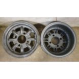 A pair of Mini 10" Minilite alloy wheels, part number SB 14593.