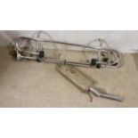A 1990 Rover Mini part exhaust and a chrome front and rear nudge bar set.