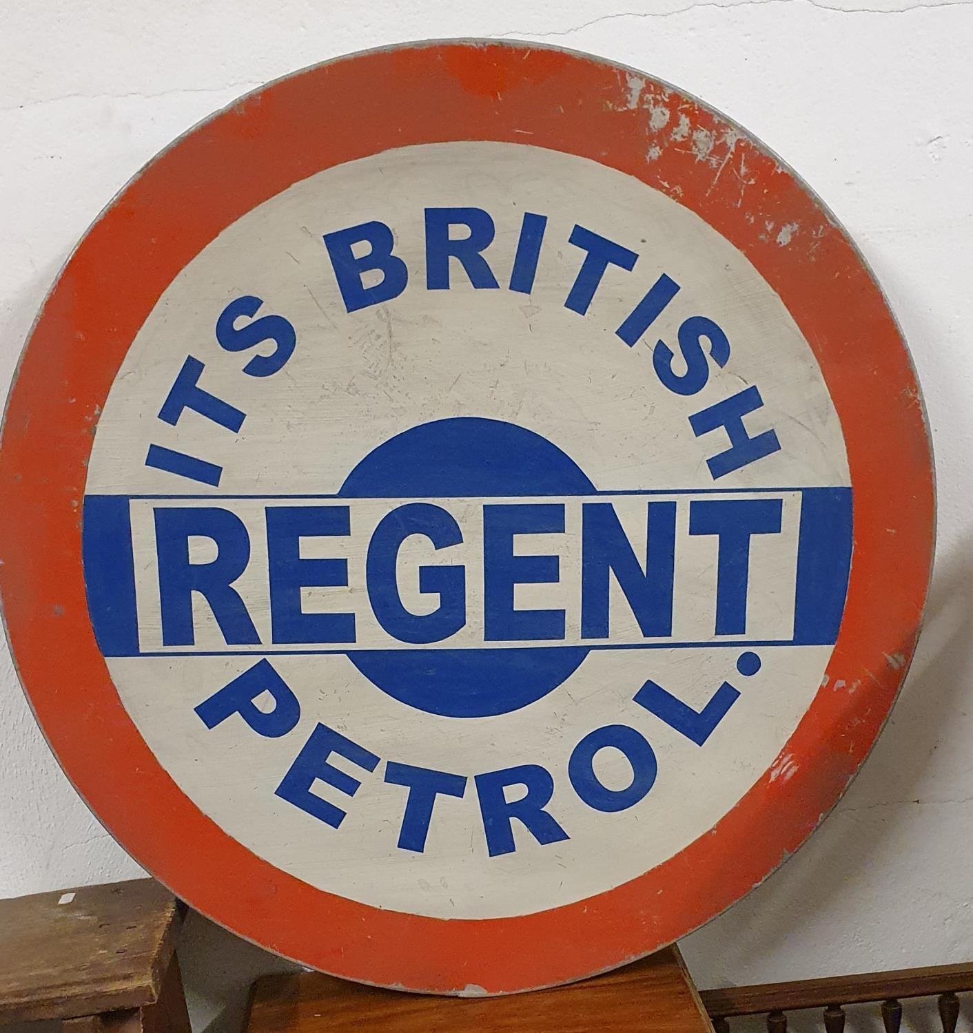 A single sided circular sign, painted with Its British Regent Petrol motif, diameter 80 cm.