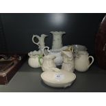 A selection of ceramics by Belleek Ireland including jugs bowls etc
