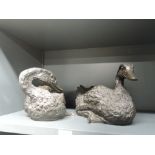 Two life size replica mallard duck figures in a bronze effect