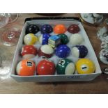 A set of childs size pool or billiard balls