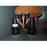 A pair of binoculars by Snaith of Kendal Shima 10x50
