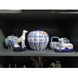 A collection of reproduction ceramics including Greyhound pair, pumpkin spice jar etc
