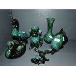 A selection of green and black glazed animal figures by Blue Mountain