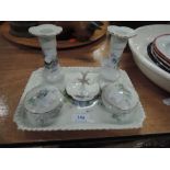 A six piece dressing table set in blue floral design