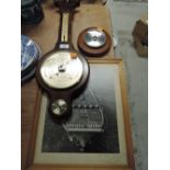 Two barometers and a photograph of a battleship