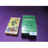 Two packets of Tarot cards including De Marseille and Pamela Colman Smith
