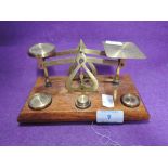 A set of brass postal or letter balance scales